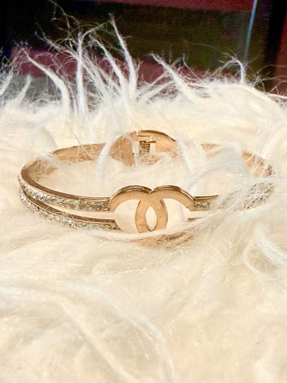 Gold-Tone Double Band Crystal Bracelet with Interlocking Motif